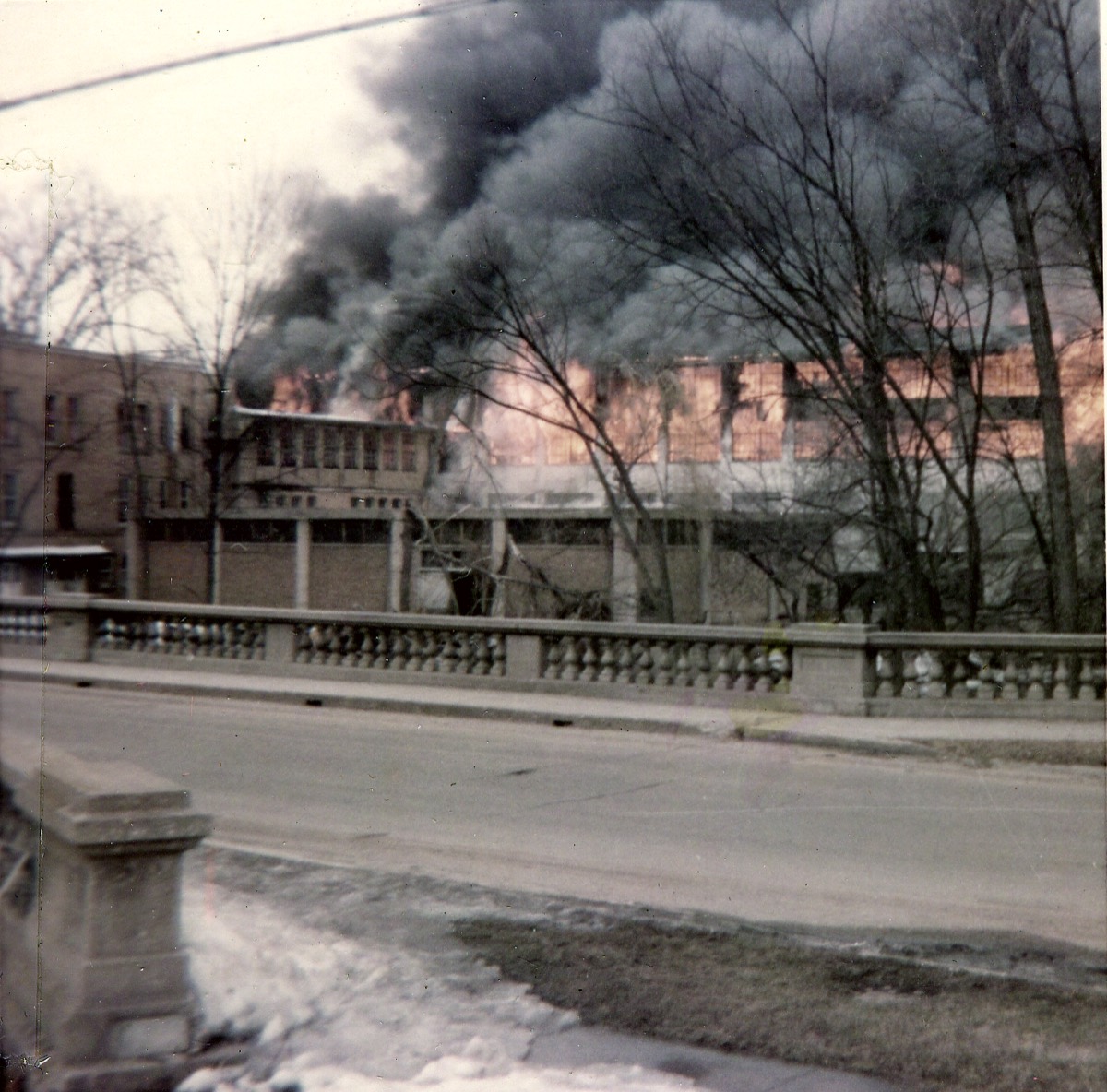 The Island Woolen Mill burning across the river in 1969.