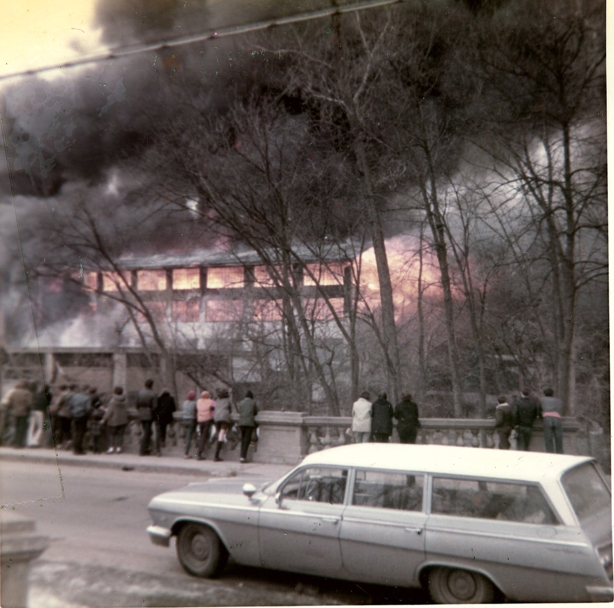 Residents watching the Island Woolen Mill fire from a bridge in 1969.