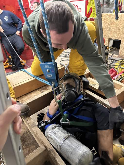Baraboo Area Fire and EMS District personnel conducting confined-space rescue training.